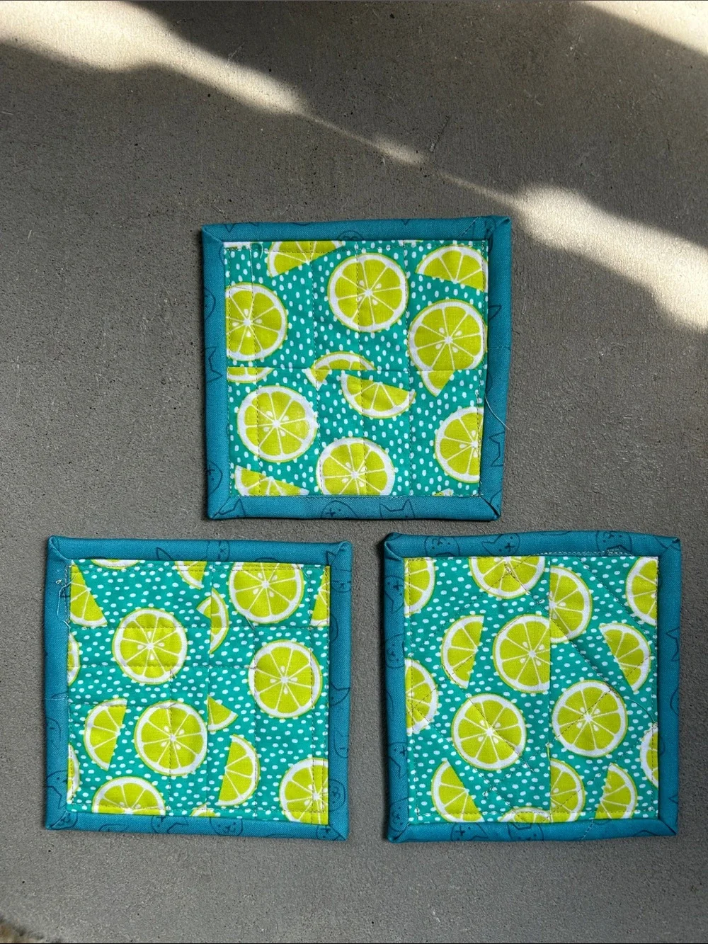 Handmade Patchwork Fabric Coasters - Teal Trim, Lime & Macaron Prints
